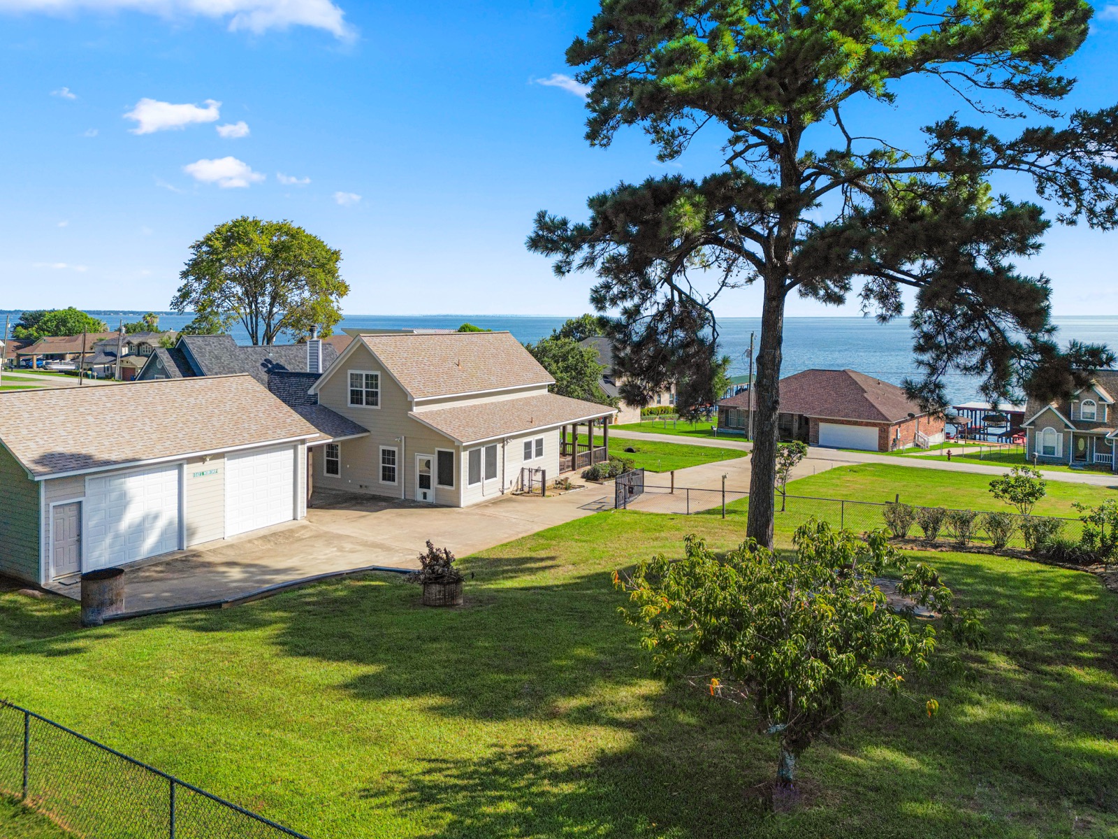Elevated view of a home and landscaped property
