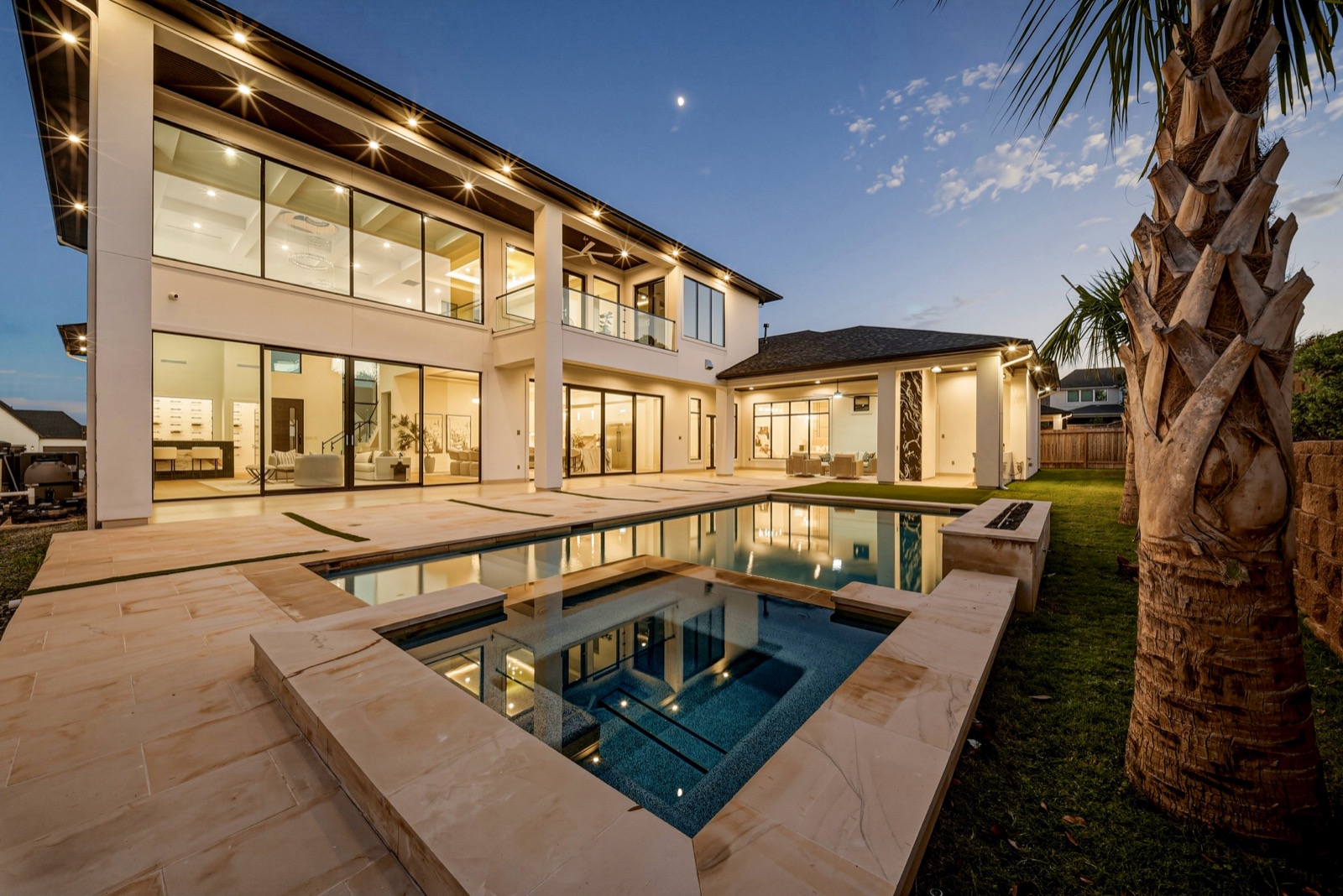 Contemporary residence and reflecting pool at twilight