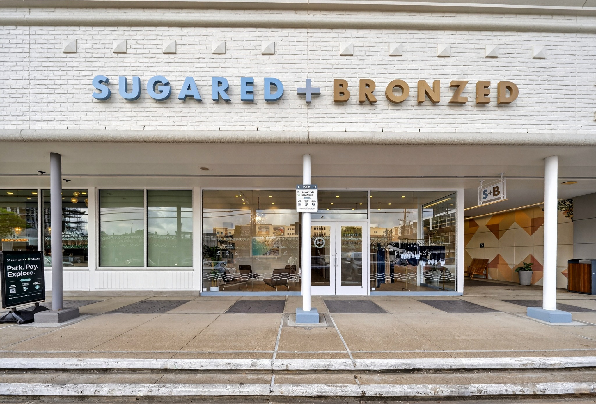 Sugared and Bronzed storefront with illuminated signage