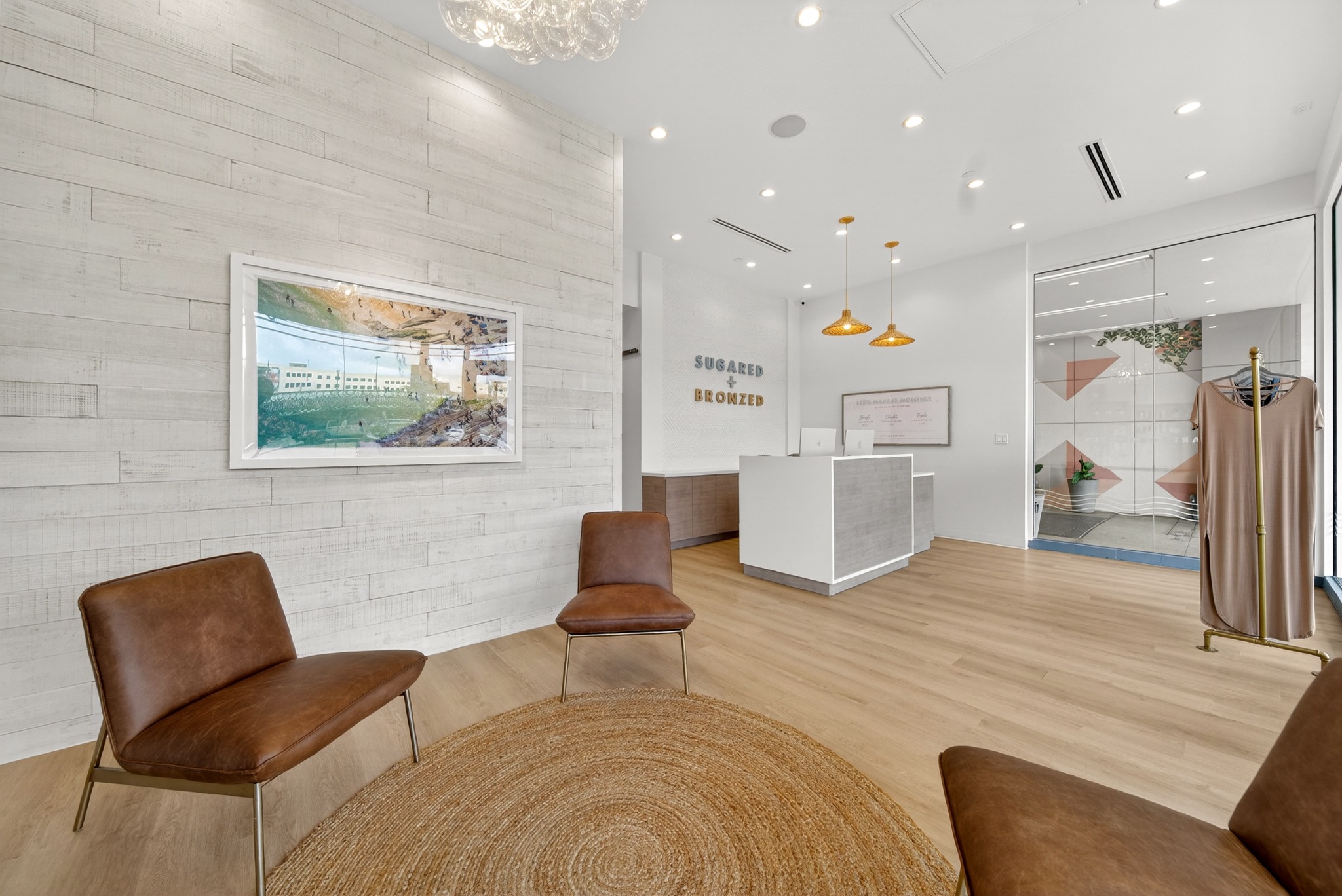 Open waiting area with seating and reception desk